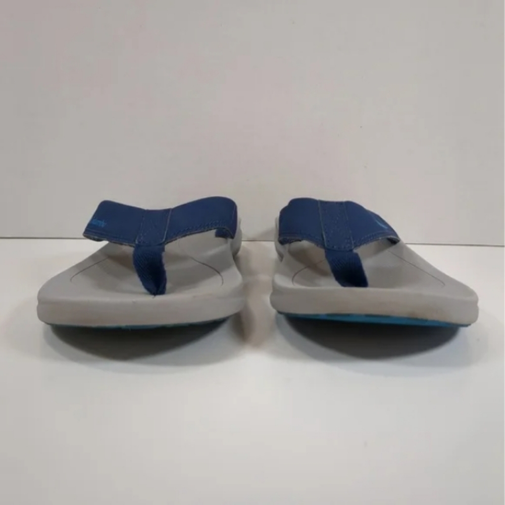Grey flip flops